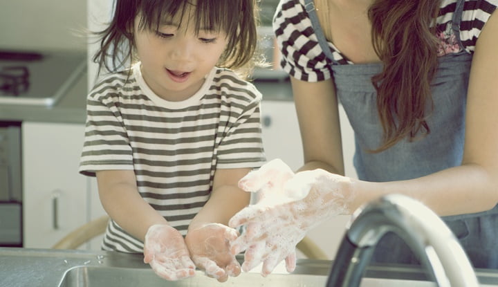 Mother and Son Washing Hands