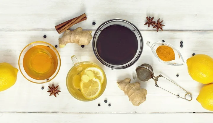 Cup of ginger tea with lemon and honey