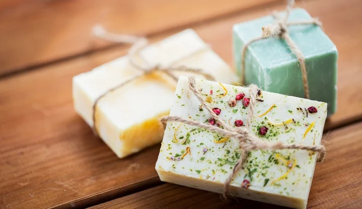 close up of handmade soap bars on wood
