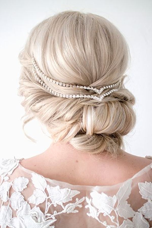 sleek-low-buns-with-big-accessories-4
